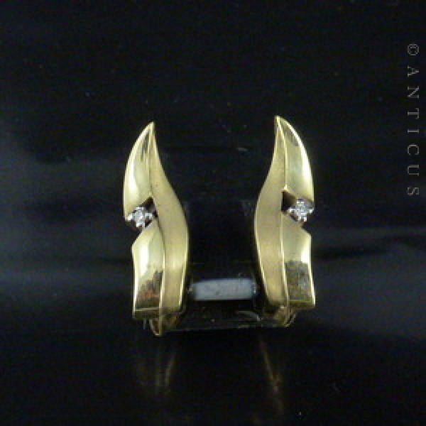 Gold and Diamond Leaf-Shaped Earrings.