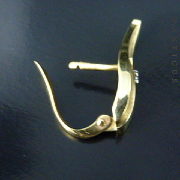 Gold and Diamond Leaf-Shaped Earrings.