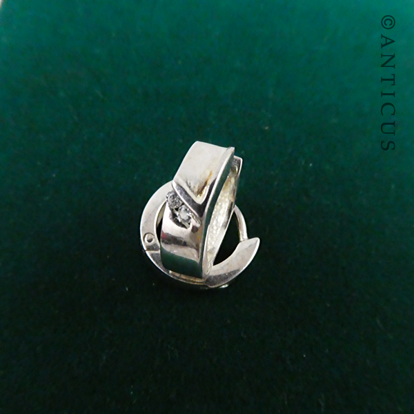 Sterling Silver Tiny Hoop Earrings.