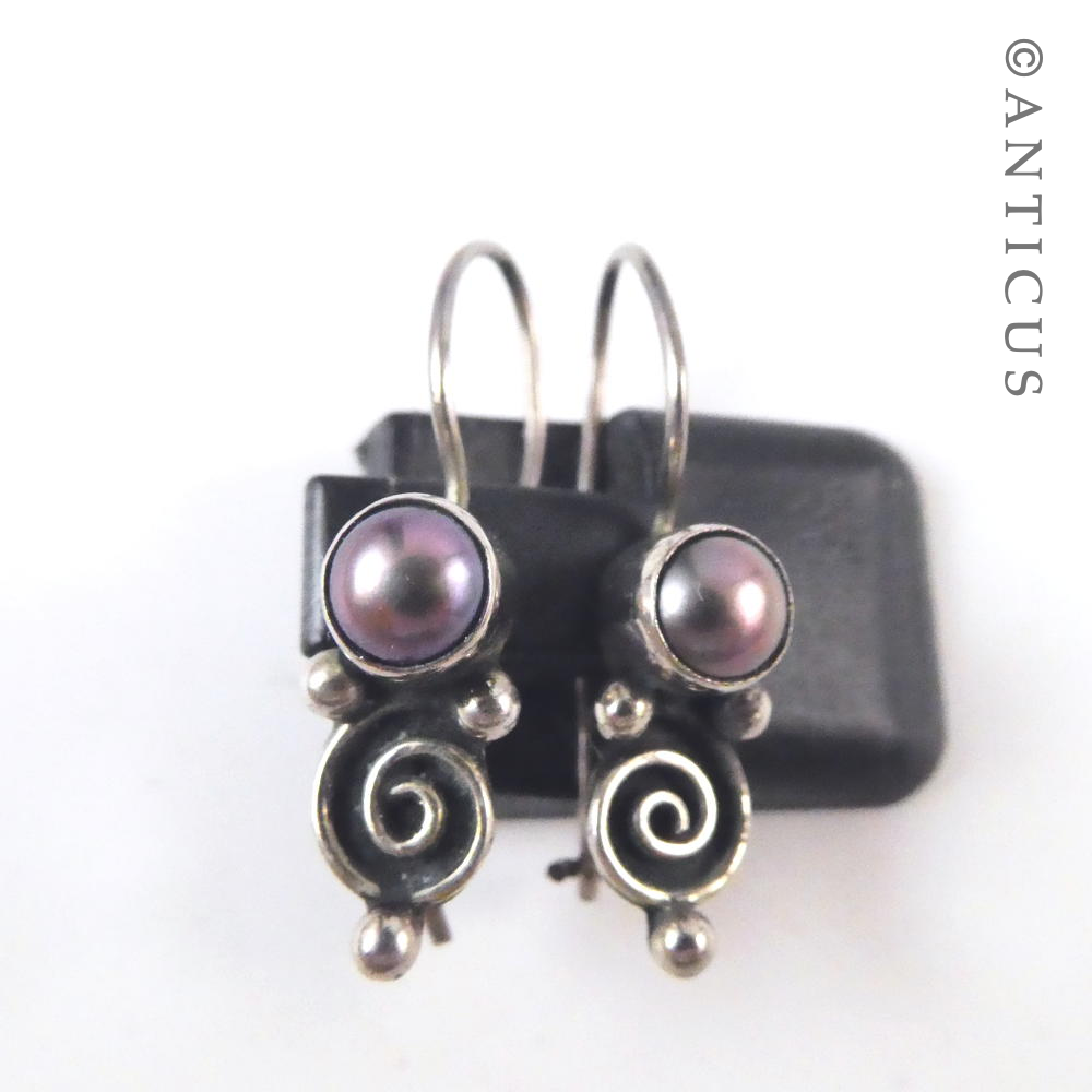 Sterling Silver and Pearl Koru Motif Earrings.