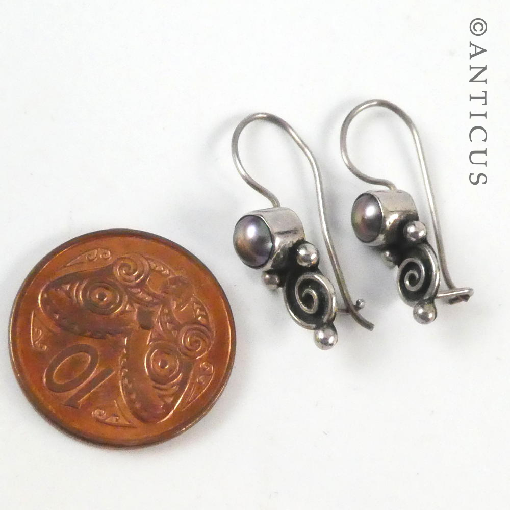 Sterling Silver and Pearl Koru Motif Earrings.