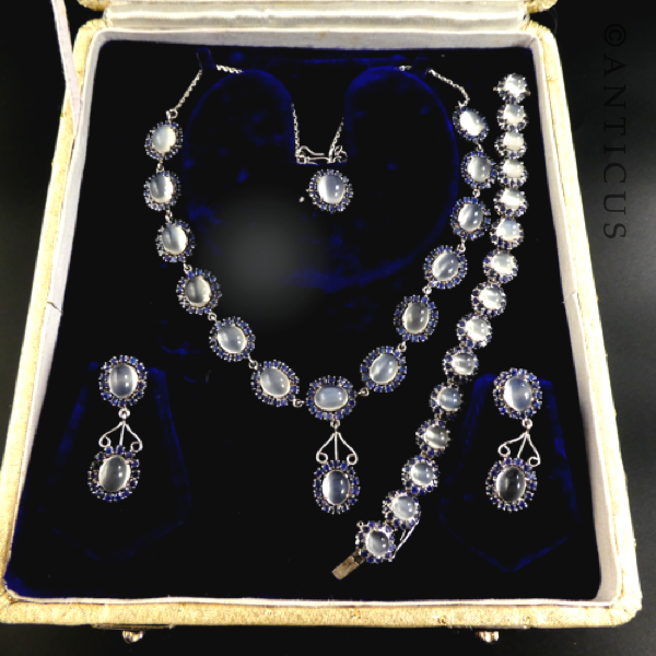 Moonstones, Sapphires and Silver Parure Set.