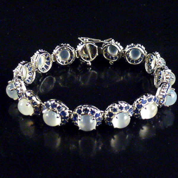 Moonstones, Sapphires and Silver Parure Set.