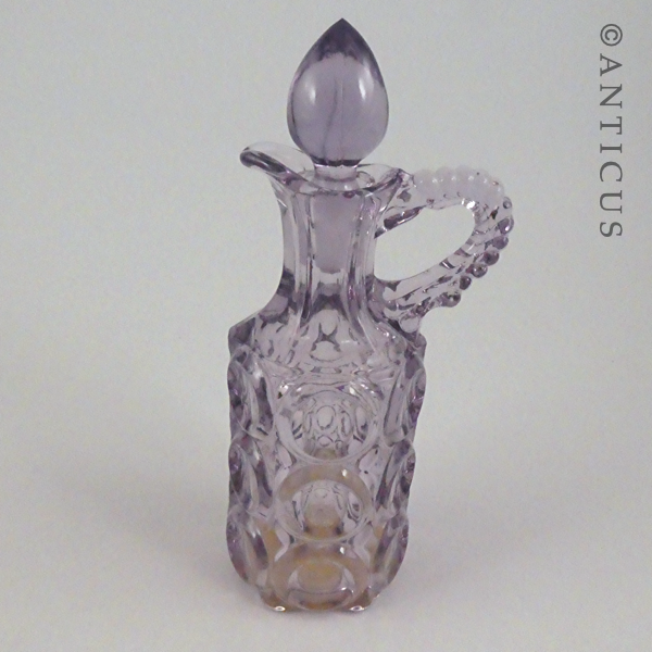 Mauve Glass Vinegar Jug.