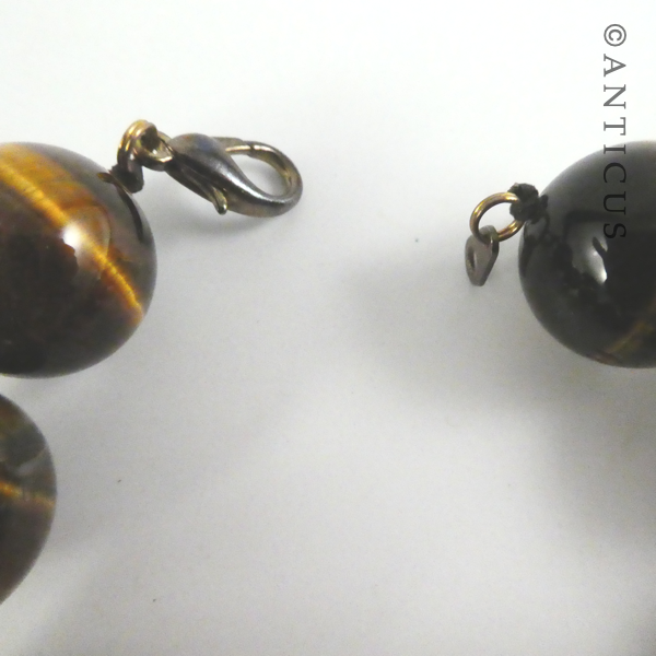 Long Strand of Large Tiger's Eye Beads, and Bracelet.