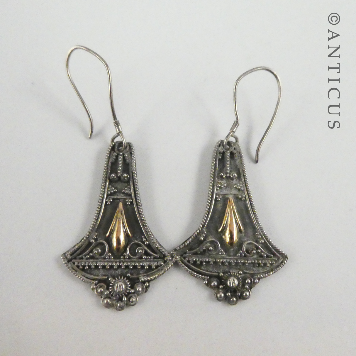 Pair of Silver Filigree and Gold Earrings.
