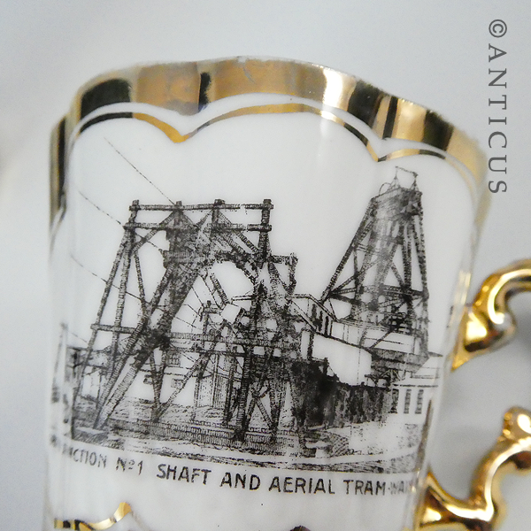 Two Small Coffee Cans with Waihi Gold Mining Images.