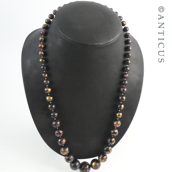 Necklace of Black, Pink, Gold Beads.