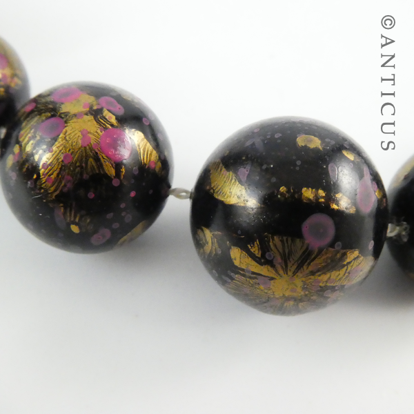 Necklace of Black, Pink, Gold Beads.