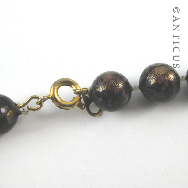 Necklace of Black, Pink, Gold Beads.