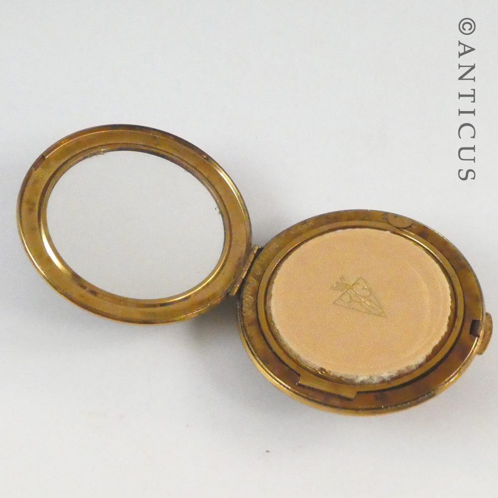 Kigu Flying Saucer Compact.