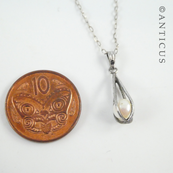 Pearl in Cage Silver Pendant.