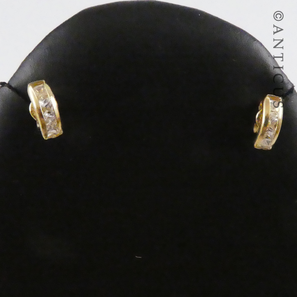 Gold and Cubic Zirconia Stud Earrings.