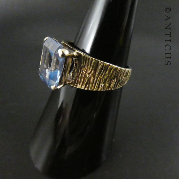 Gold and Blue Topaz Modernist Ring.