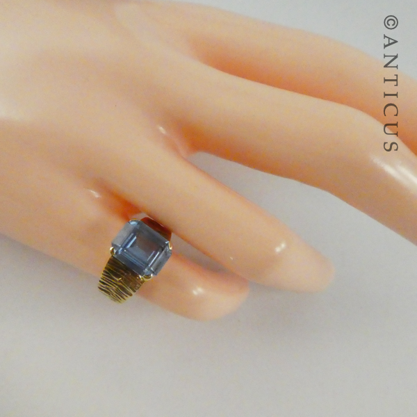 Gold and Blue Topaz Modernist Ring.
