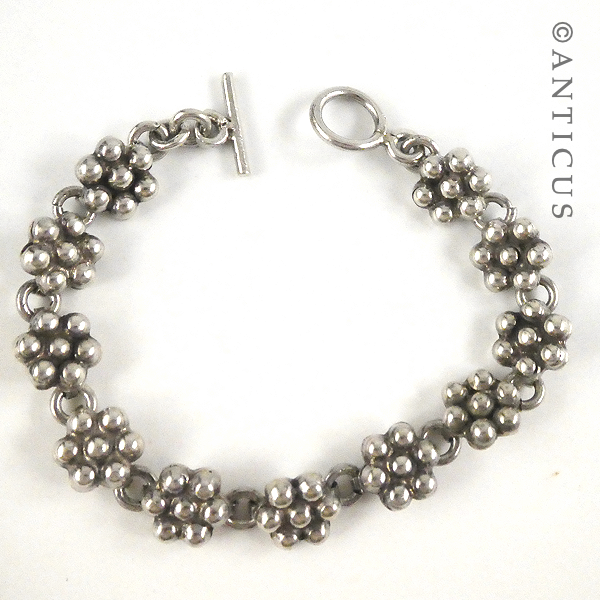 Silver Flower-Link Bracelet.