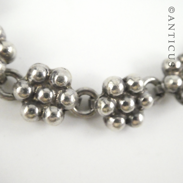 Silver Flower-Link Bracelet.