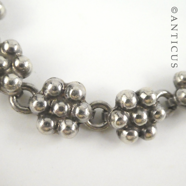 Silver Flower-Link Bracelet.