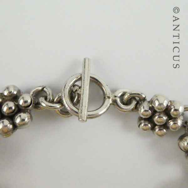 Silver Flower-Link Bracelet.