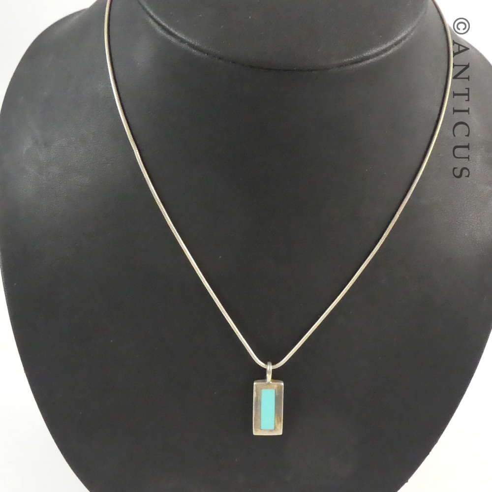 Silver and Turquoise Pendant on Chain.