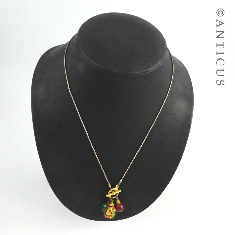 Bead Necklace on Gilded T Bar Chain.