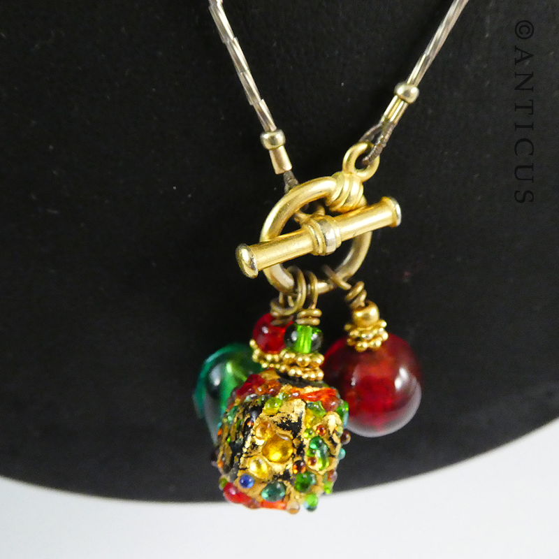 Bead Necklace on Gilded T Bar Chain.