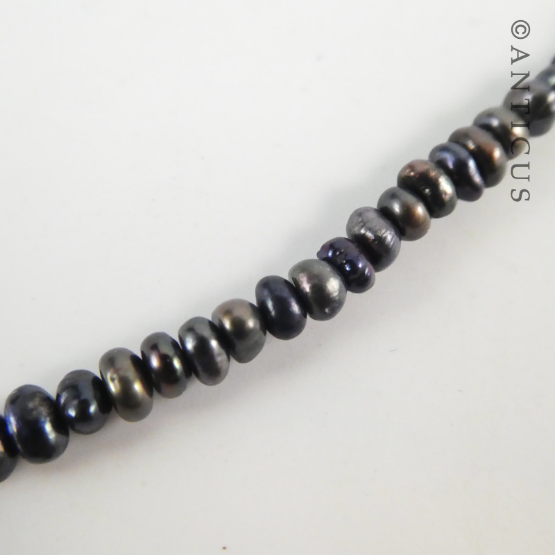 Black Pearl Pendant on Seed Pearls Necklace.