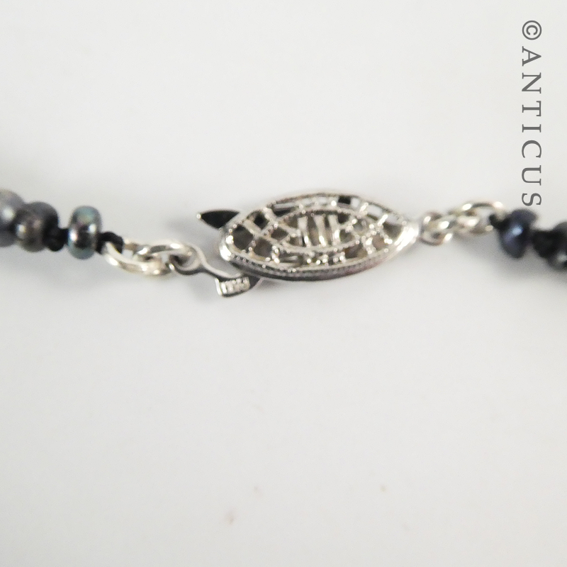 Black Pearl Pendant on Seed Pearls Necklace.