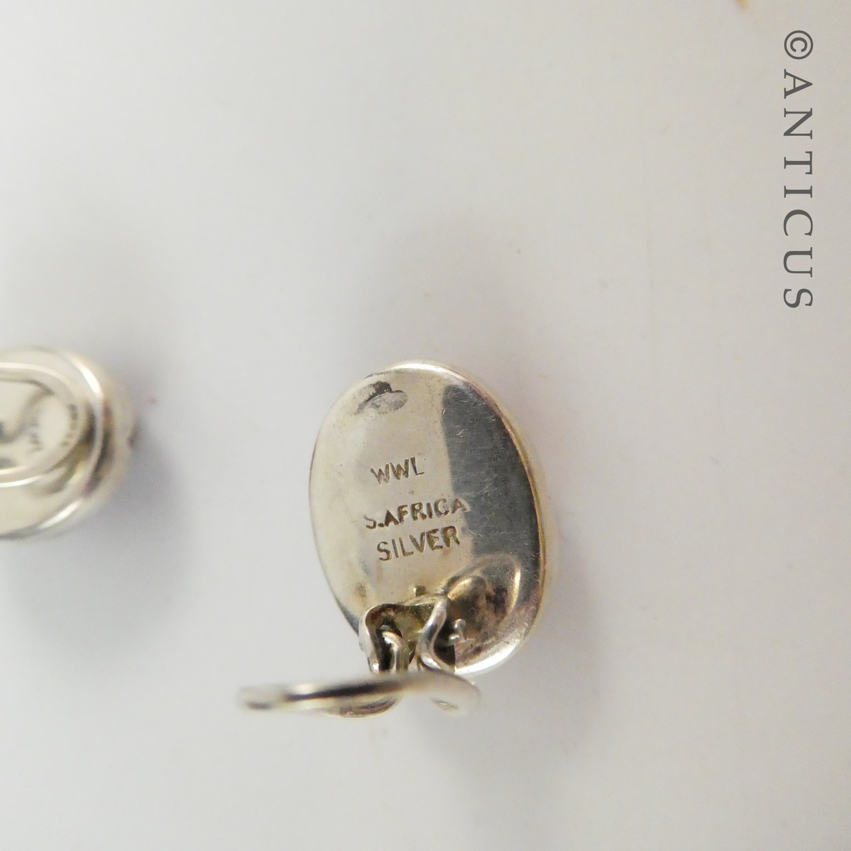 Brick-Coloured Clip Earrings with Silver Mounts.