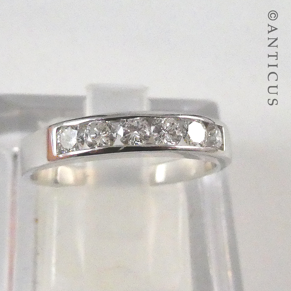18ct White Gold and Diamond Band Ring.