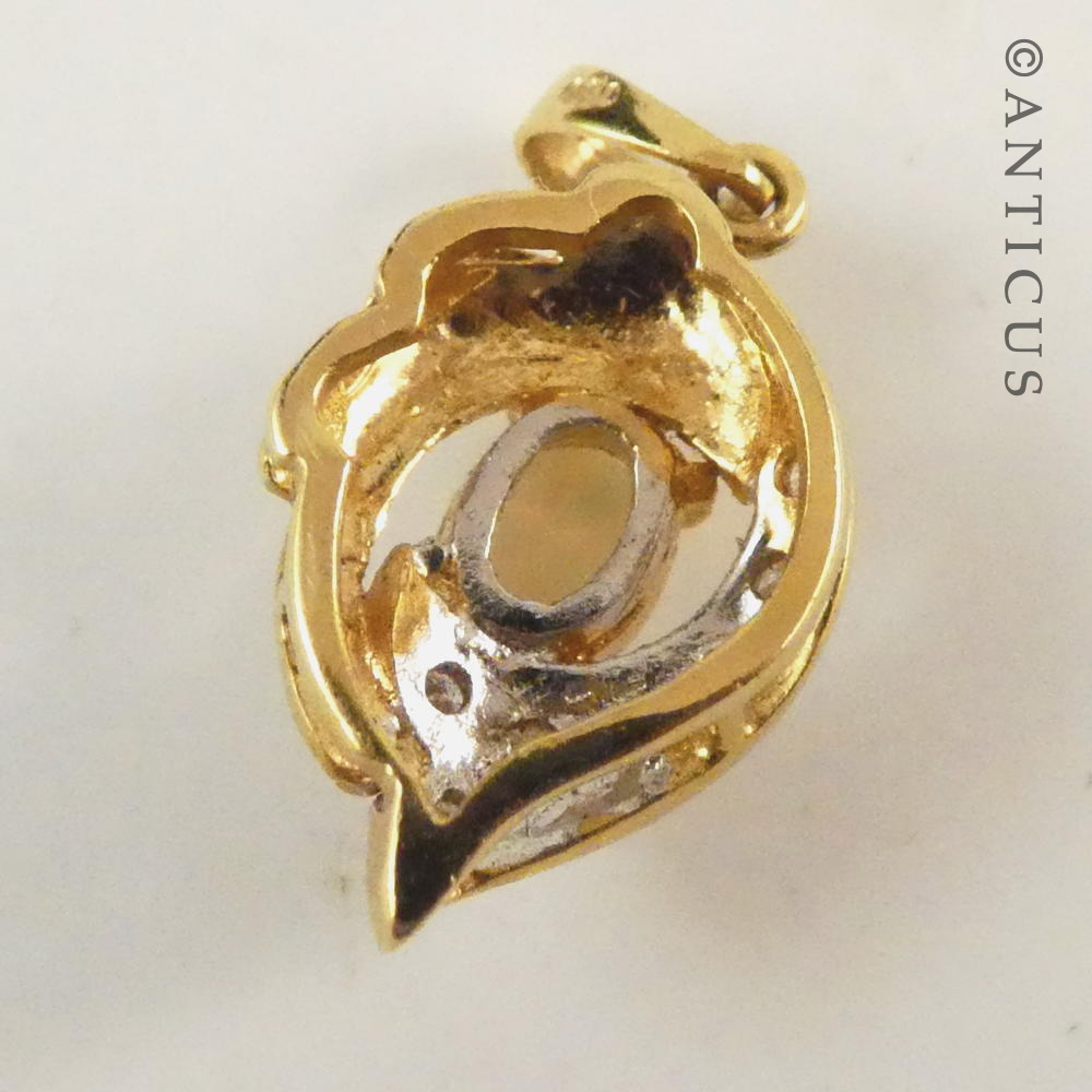 Small 18ct Gold, Opal and Diamond Pendant.
