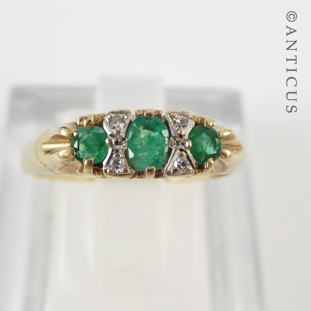 Gold, Emerald and Diamond Small Bridge Ring.
