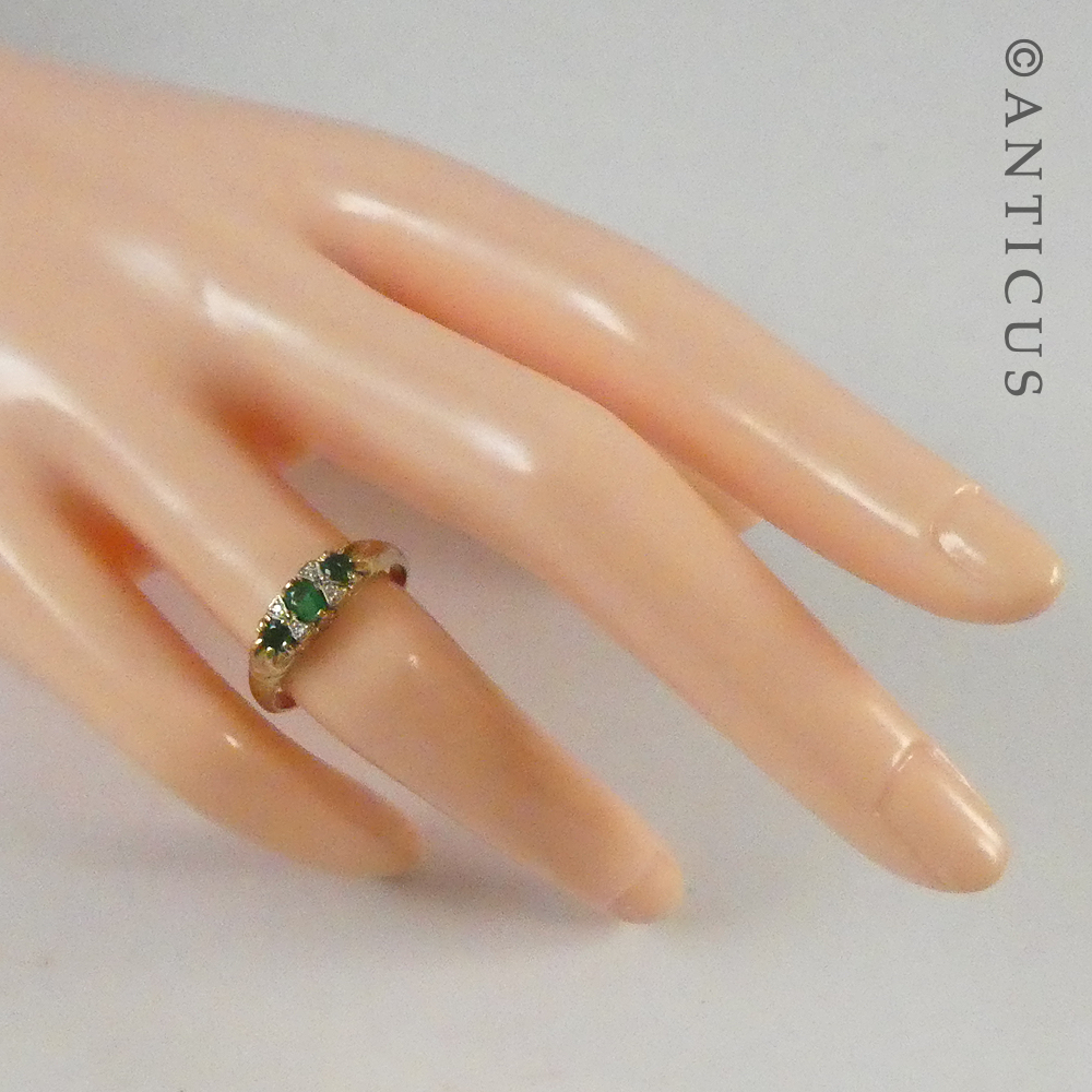 Gold, Emerald and Diamond Small Bridge Ring.