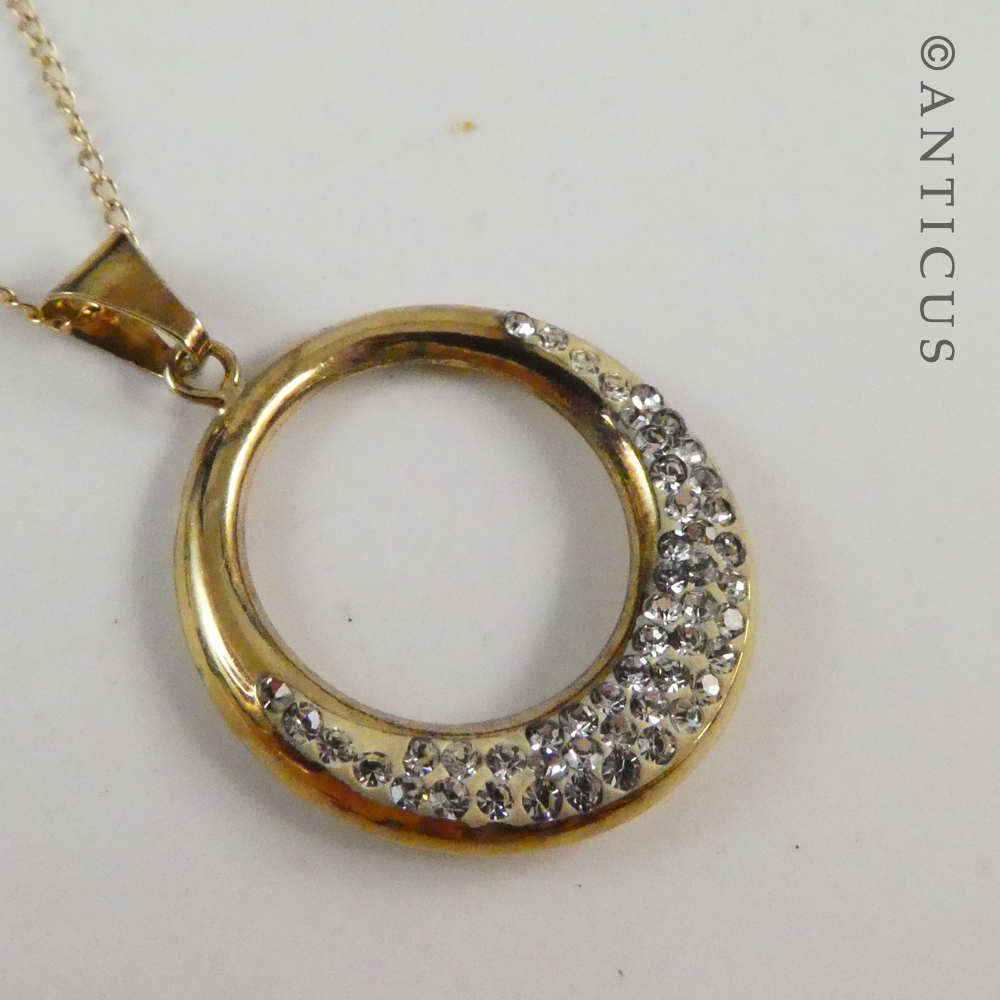 Gold Circle Pendant and Chain with Crystals.