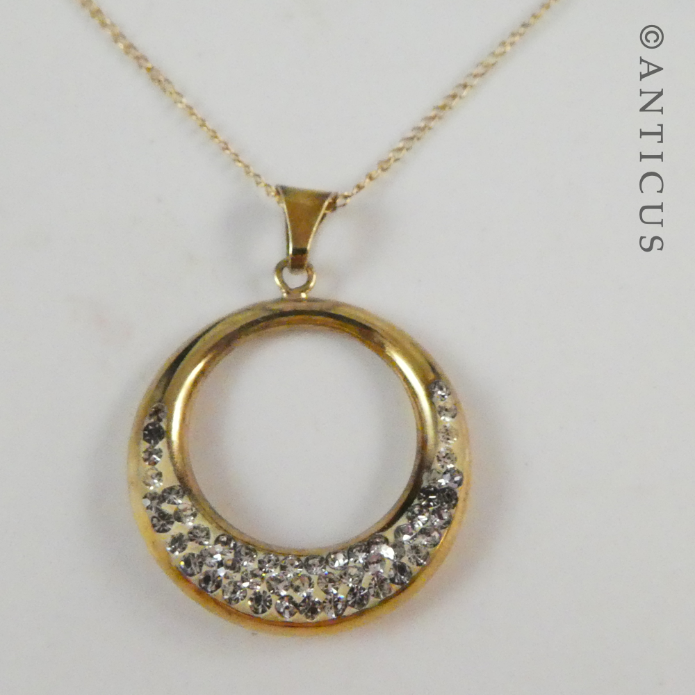 Gold Circle Pendant and Chain with Crystals.