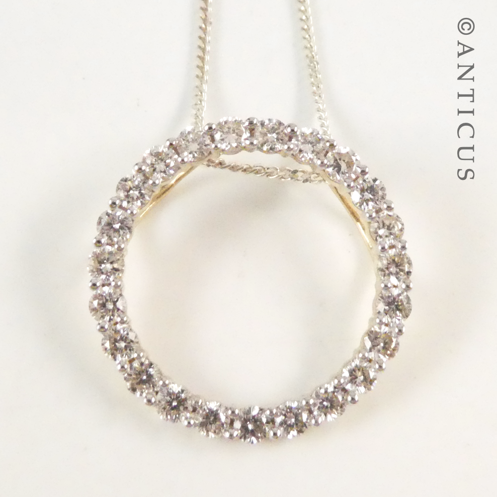 Gold and Diamond Circular Pendant on Chain.
