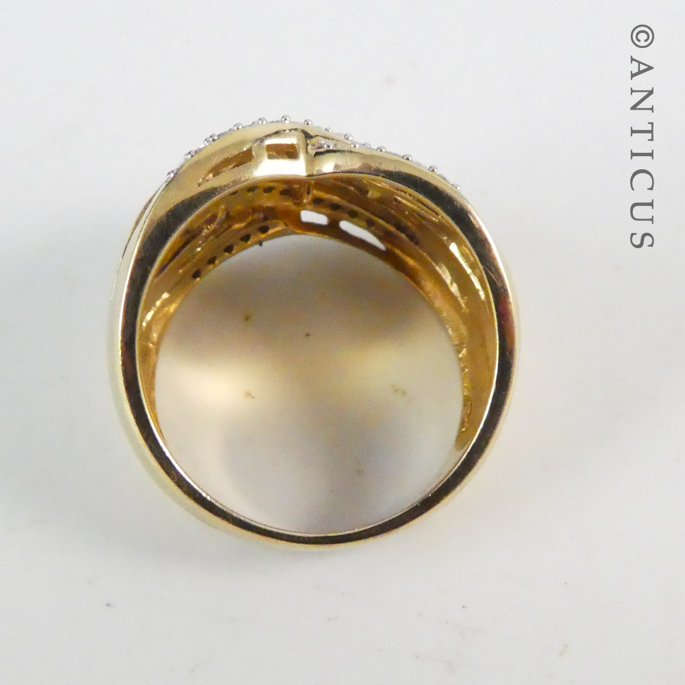 Gold and Diamond Wide Cross-Over Ring.