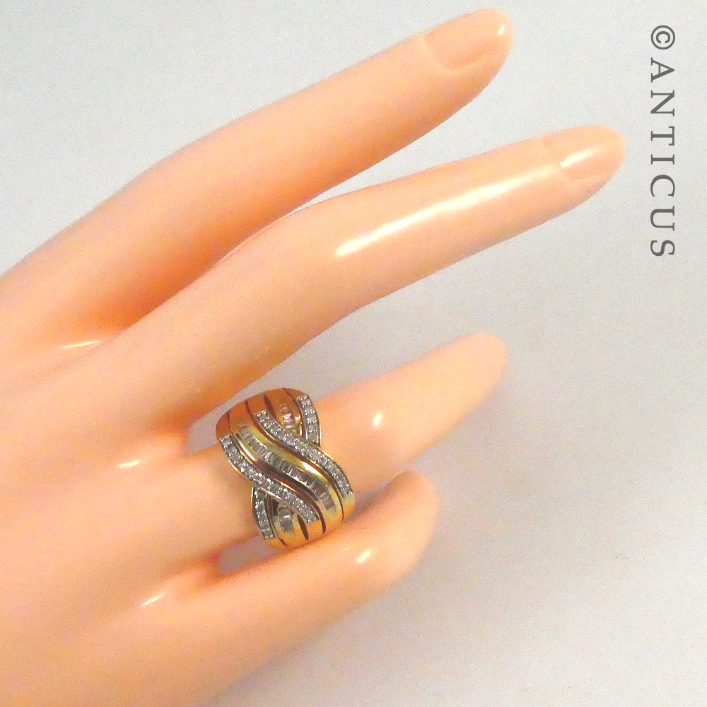 Gold and Diamond Wide Cross-Over Ring.