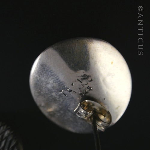 Concave Silver Disc Earrings with Hatched Design.