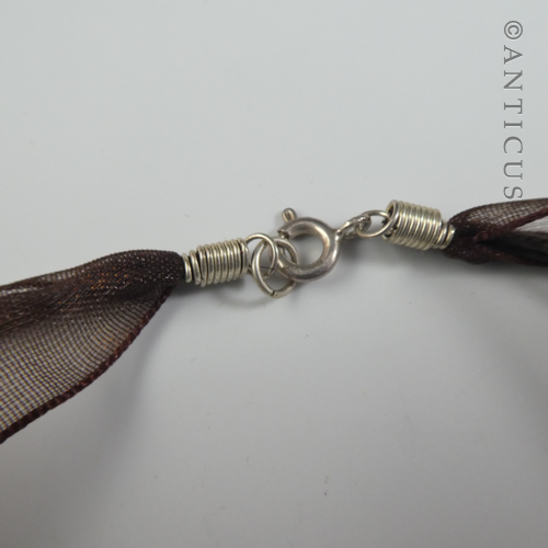 Polished Bronze Heart Pendant on Organza Ribbon.
