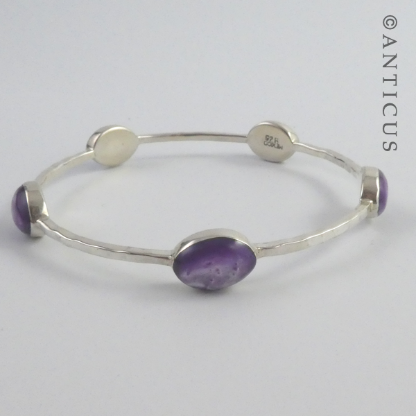 Beaten Silver Bangle with Purple Stones.
