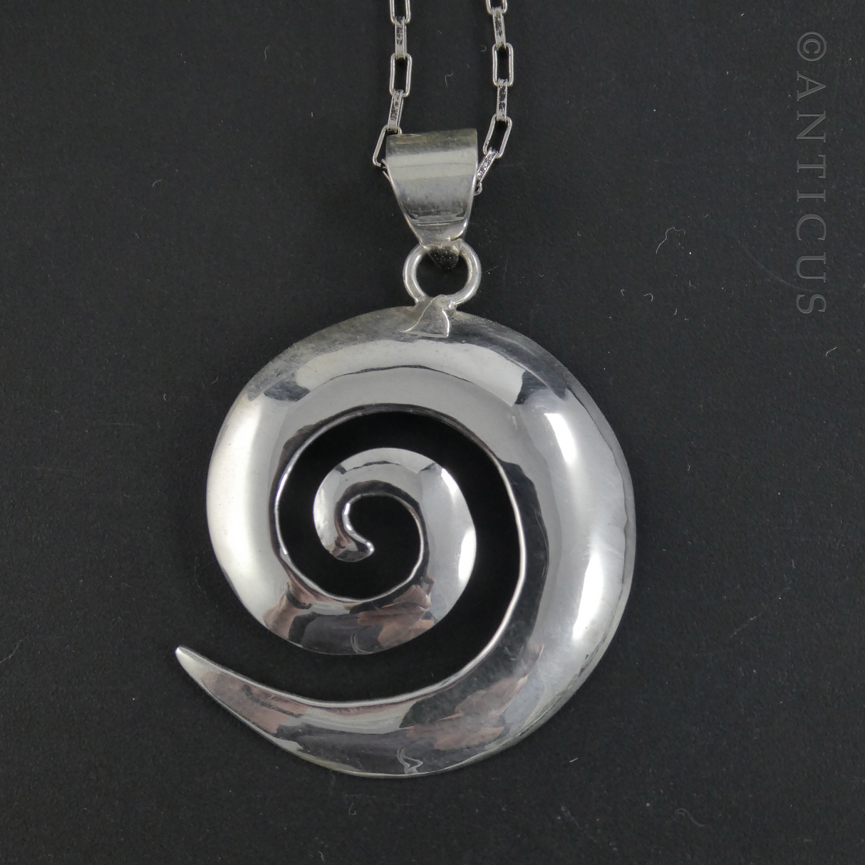 Sterling Silver Koru Pendant on Silver Chain.