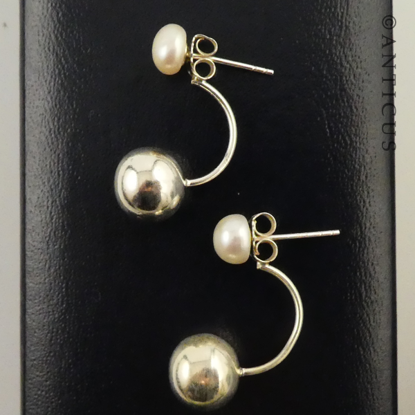 Silver and White Pearl Ear Hugging Earrings.