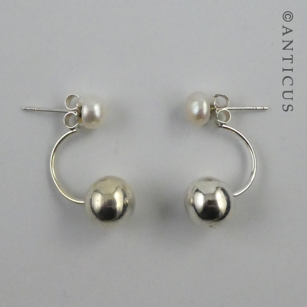 Silver and White Pearl Ear Hugging Earrings.