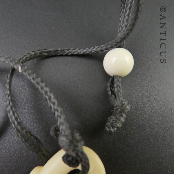 Carved Bone Maori Fish-Hook Pendant.