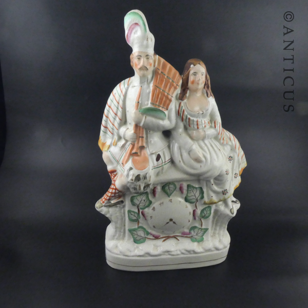 Staffordshire Flat Back Figurine of Highland Couple.