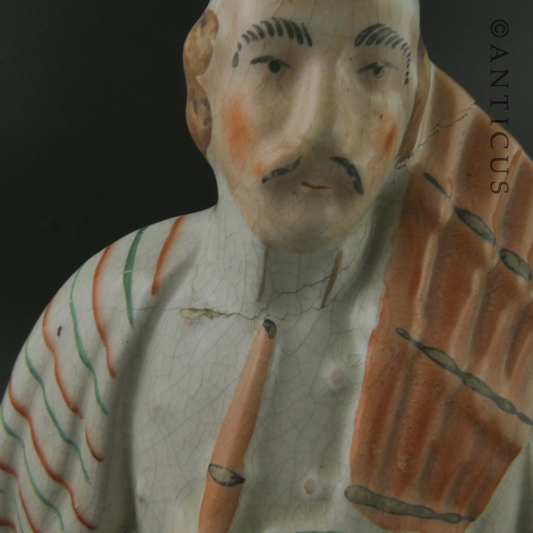 Staffordshire Flat Back Figurine of Highland Couple.