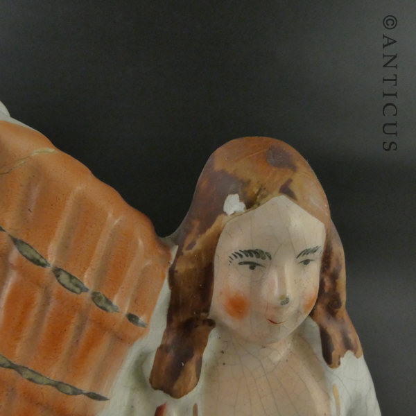 Staffordshire Flat Back Figurine of Highland Couple.