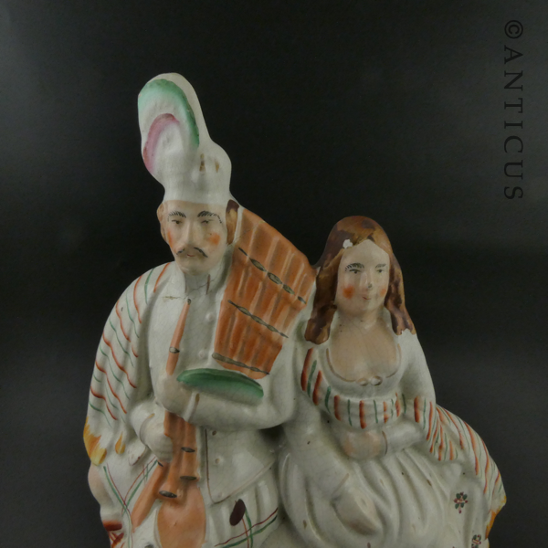 Staffordshire Flat Back Figurine of Highland Couple.