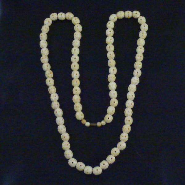 Long Strand, Carved Bone Beads, Early 20th Century.
